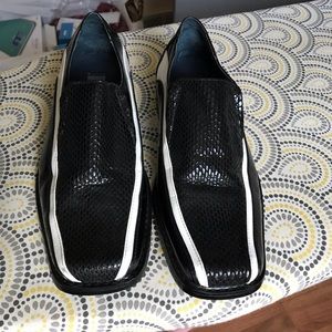 Boys size 5.5 black and white dress shoes.